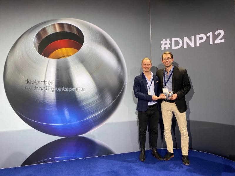 Philipp and Lukas holding award